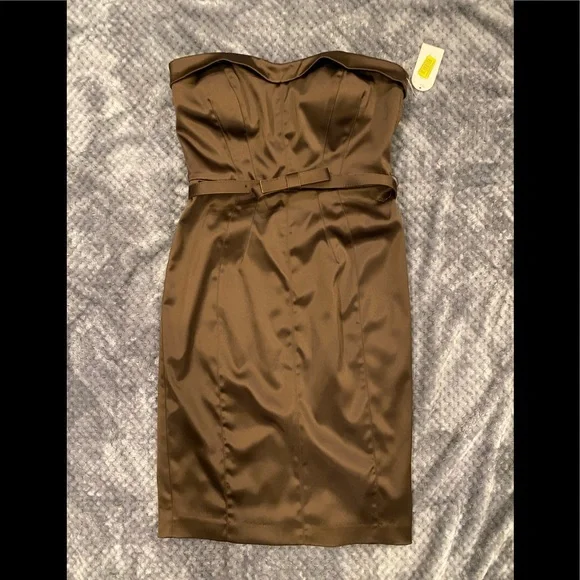 jessica simpson brown dress Jessica Simpson fashionable figure in skin-tight brown mini dress